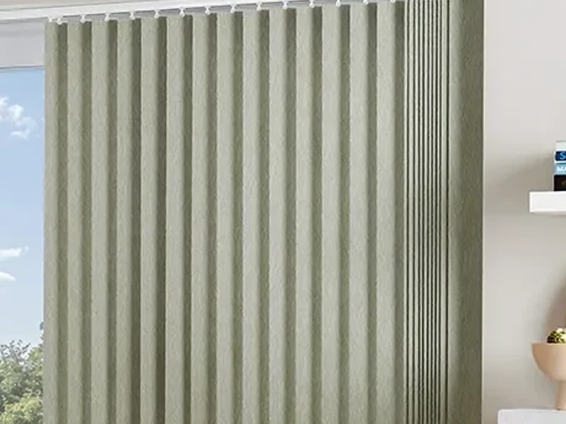 Close-up of overlapping fabric louvres on a vertical blind